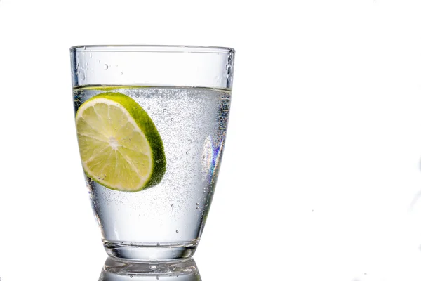 Water glass and lime — Stock Photo, Image