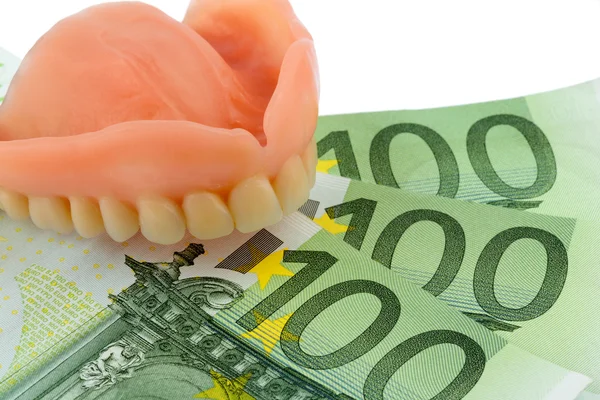 Dentaduras e notas de euro — Fotografia de Stock