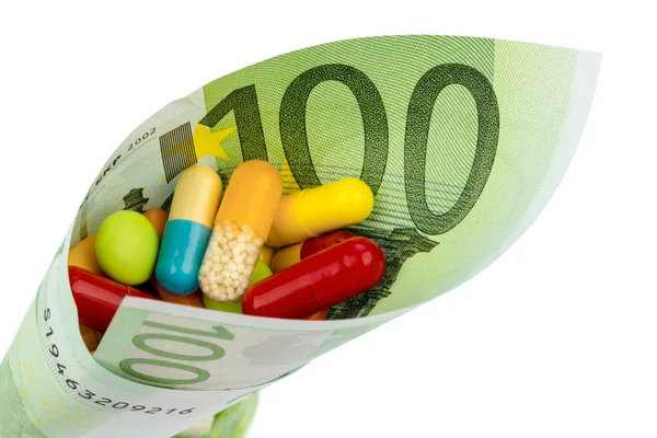 Tablets and one hundred euro bill — Stock Photo, Image