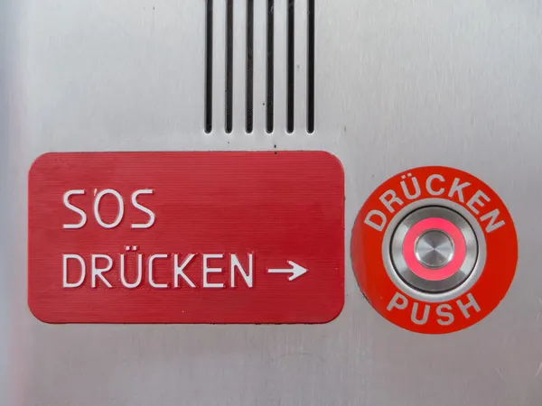 An emergency phone at a railway station — Stock Photo, Image