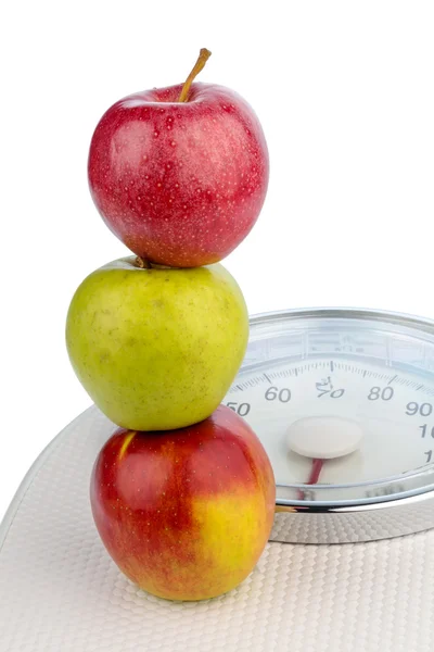 Apples on a balance — Stock Photo, Image