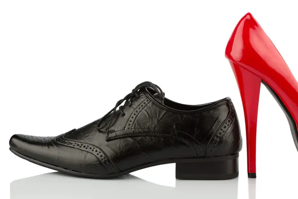 Red high heels and men's shoe — Stock Photo, Image