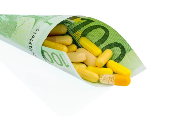 Tablets and one hundred euro bill — Stock Photo, Image