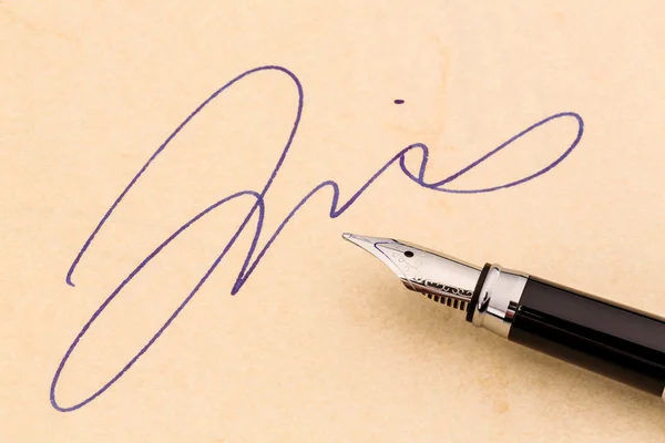 Signature and fountain pen — Stock Photo, Image