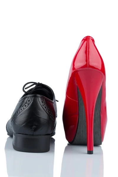 High heels and men's shoe — Stock Photo, Image