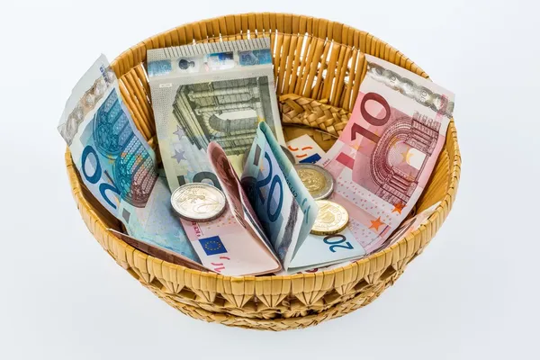 Basket with money from donations — Stock Photo, Image