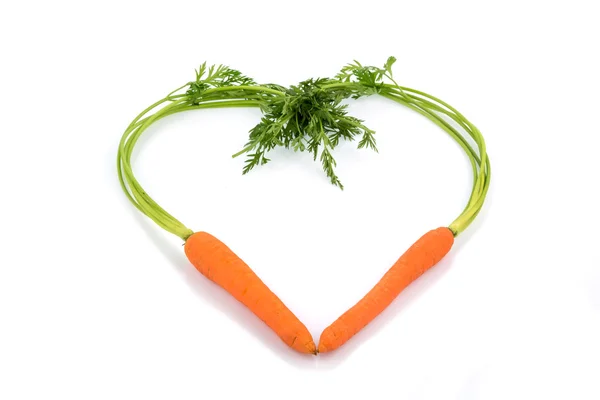 Świeże marchewki w kształcie serca — Zdjęcie stockowe