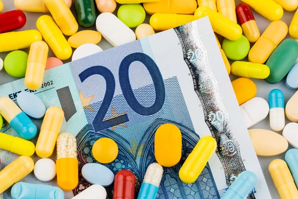 Eurobiljetten en tabletten — Stockfoto