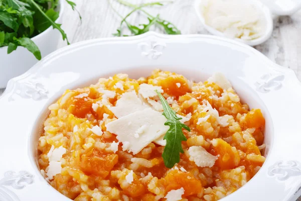 Pumpkin porridge with rice and parmesan — Stock Photo, Image