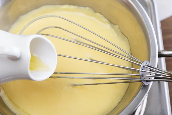 Hollandaise sauce cooking process — Stock Photo, Image