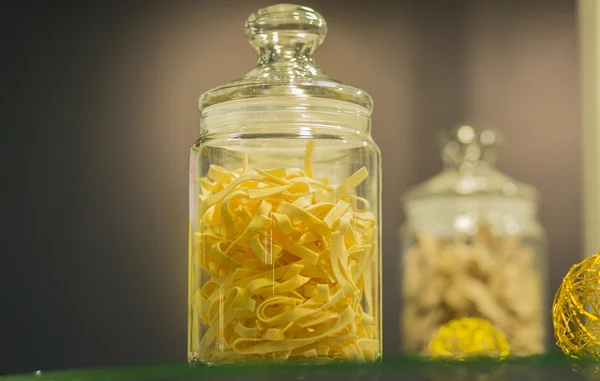 Pasta in glass jar — Stock Photo, Image