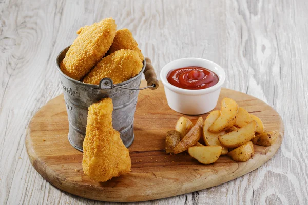 Asas de frango empanadas — Fotografia de Stock