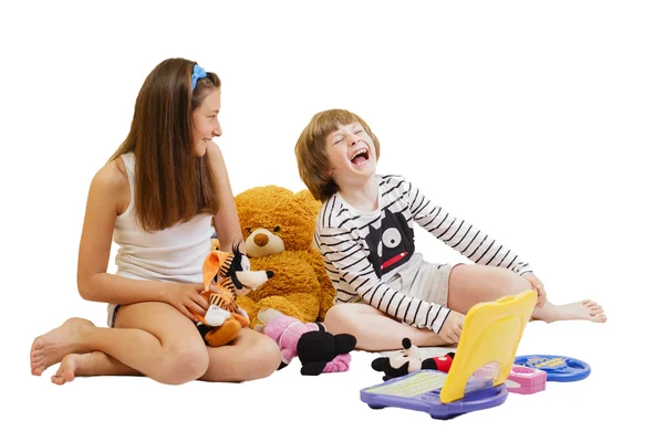 Boy and girl playing with toys — Stock Photo, Image