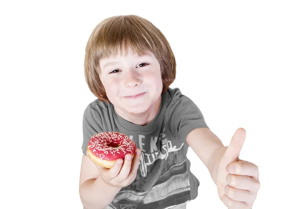 Boy with a donut on a white background — Stock Photo, Image