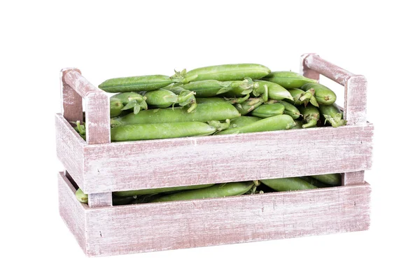 Peas in a wooden box — Stock Photo, Image
