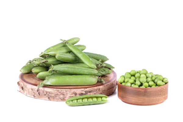 Peas in a wooden bowl — Stock Photo, Image