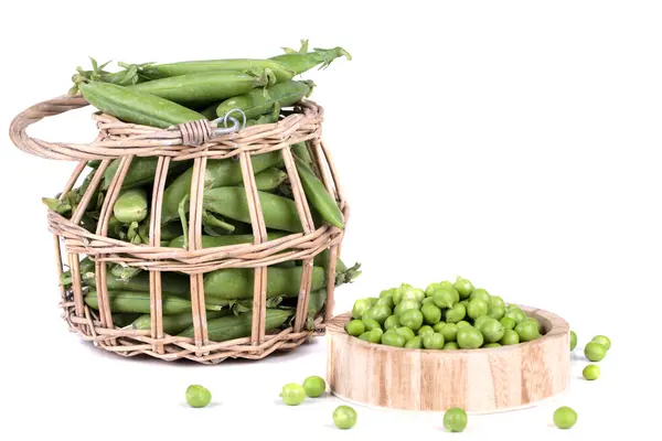 Peas in a basket — Stock Photo, Image