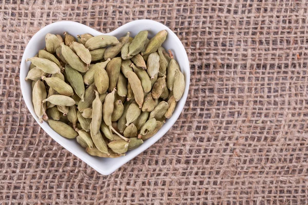 Cardamom in  cup — Stock Photo, Image