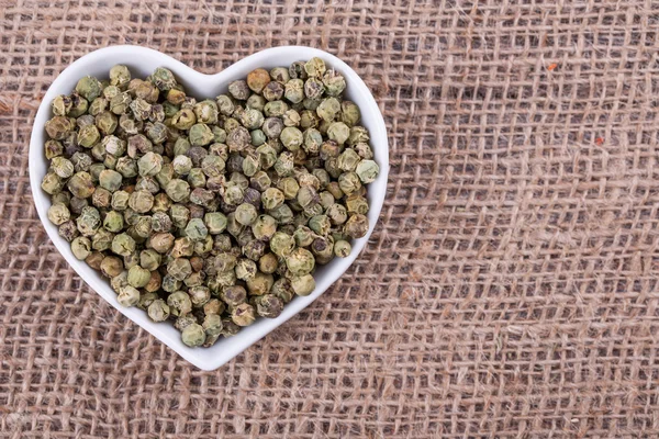 Pepper on  sack  cloth — Stock Photo, Image