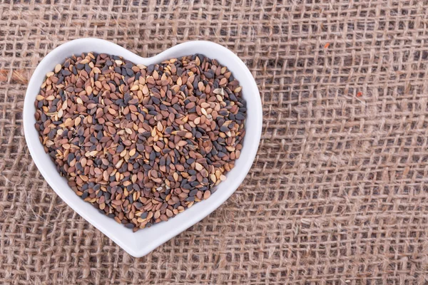 Sesame in cup — Stock Photo, Image