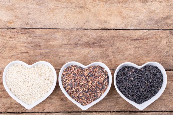 Sesame in cup — Stock Photo, Image