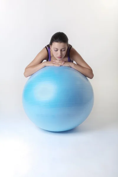 Looking over gym ball — Stock Photo, Image