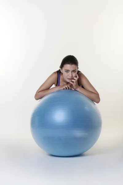Looking over gym ball — Stock Photo, Image