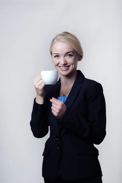 Business woman drinking tea — Stock Photo, Image