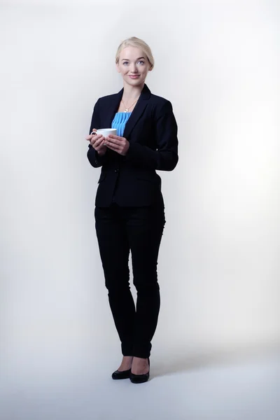 Business woman drinking tea — Stock Photo, Image