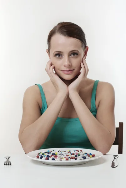 Comer pastillas — Foto de Stock