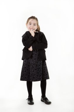 bir iş kişi olarak giyinmiş genç çocuk