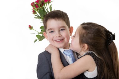 bir iş kişi olarak giyinmiş genç çocuk