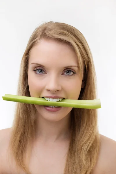 Eating celery — Stock Photo, Image