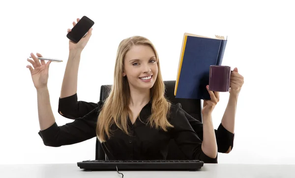 Mulher ocupada em sua mesa — Fotografia de Stock