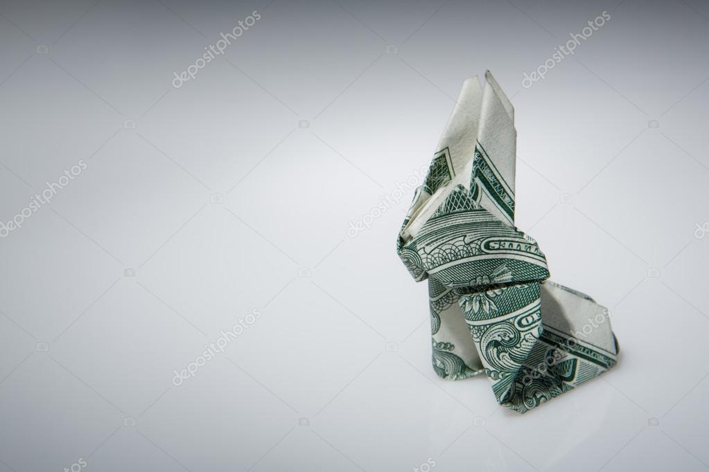 Origami The Art Of Paper Folding Stock Photo C Jayfish 51383669 - still life image of a origami rabbit make from one dollar note photo by