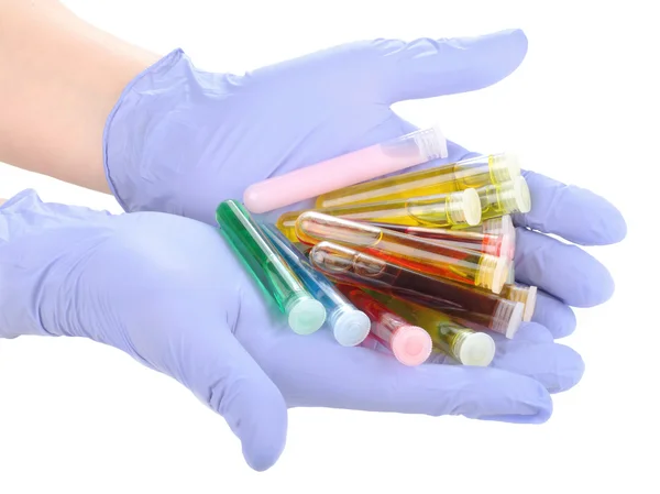 Hands with test tubes — Stock Photo, Image