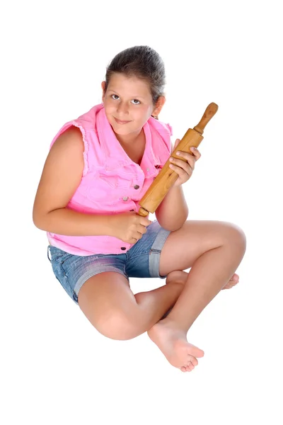 Girl with a rolling pin — Stock Photo, Image
