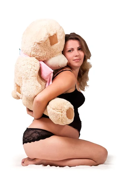 Elégante fille enceinte avec un jouet — Photo