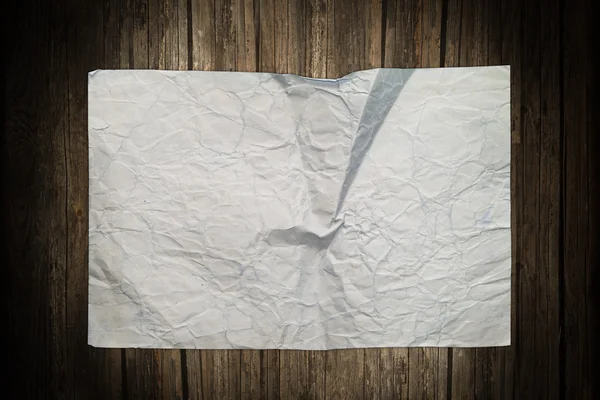 Blank crumpled paper on wood — Stock Photo, Image