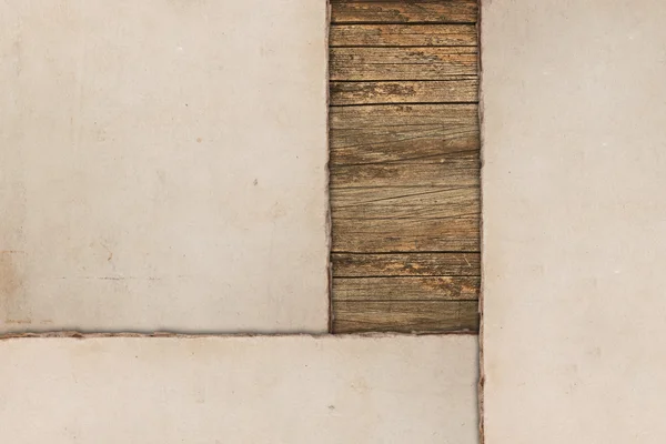 Papel velho desgastado em um fundo de madeira — Fotografia de Stock