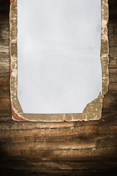 Faded old paper on cardboard — Stock Photo, Image