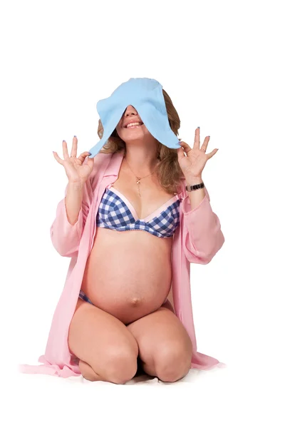 Vrolijke zwangere dame met een blauwe broek — Stockfoto