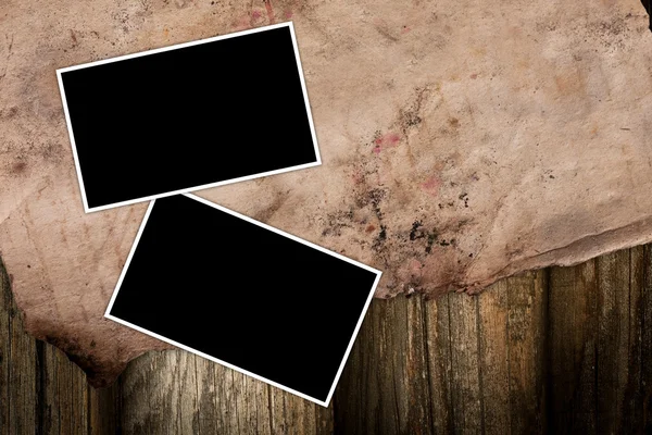 Empty photo frames on a grungy paper background — Stock Photo, Image