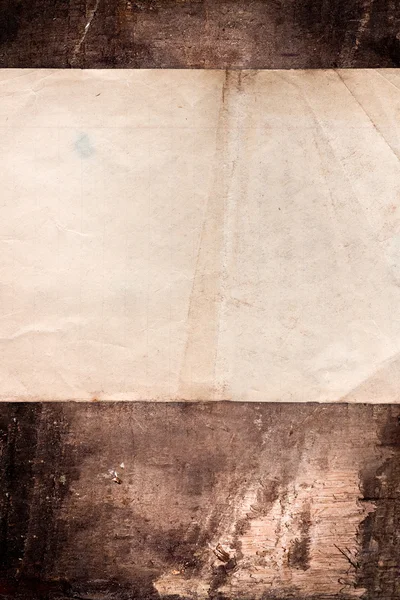 Faded old paper on a grungy background — Stock Photo, Image