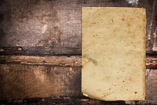 Solmuş eski kağıt üzerinde eski bir arka plan — Stok fotoğraf