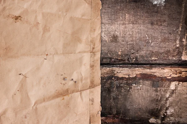 Faded old paper on a grungy background — Stock Photo, Image