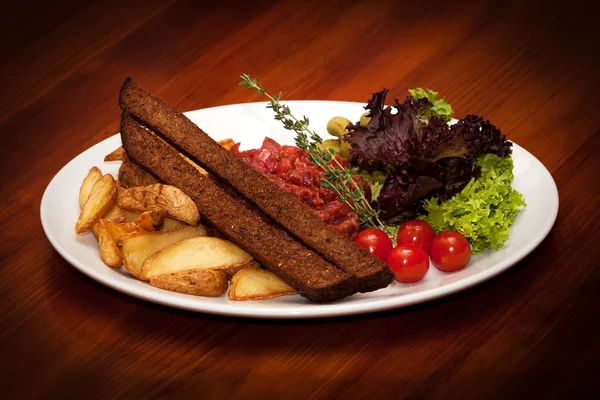 Insalata fresca con pane Foto Stock