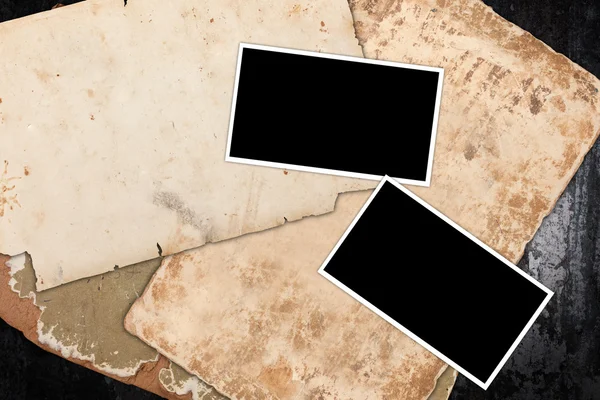 Empty photo frames on old paper — Stock Photo, Image