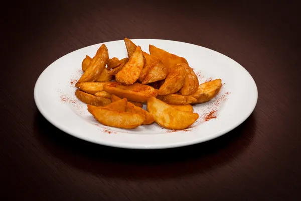 Leckere Kartoffeln auf einem Teller — Stockfoto