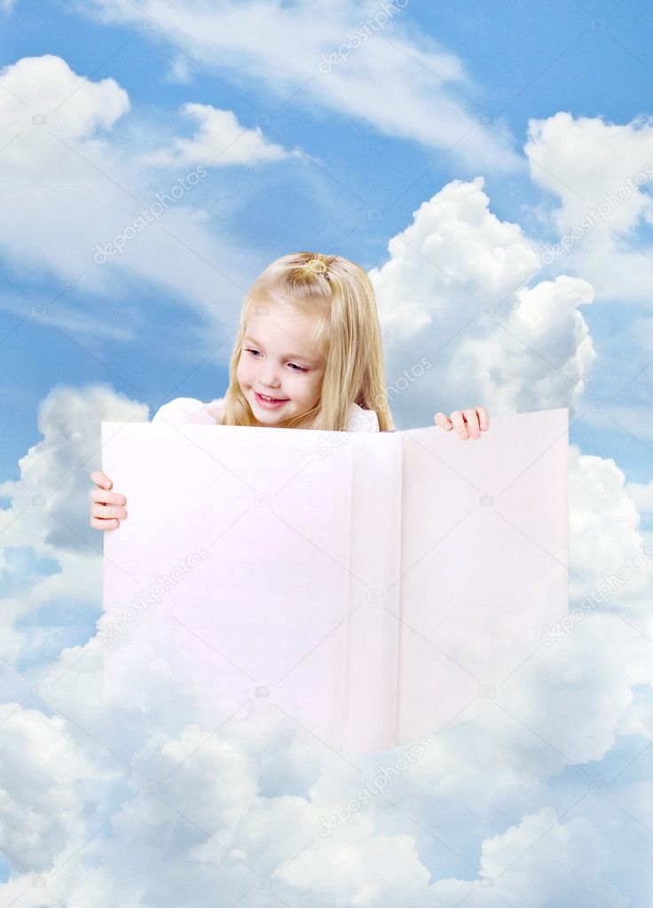 Girl and book on the clouds